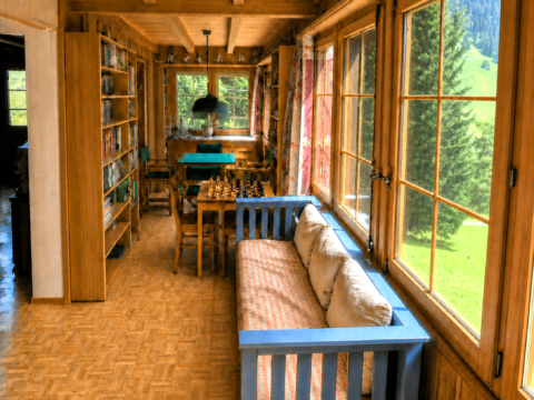Veranda con angolo biblioteca